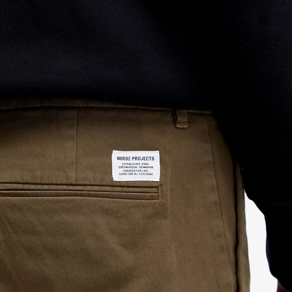 

Norse Projects Aros Тонкие брюки-чиносы из органического эластичного твила, зеленый
