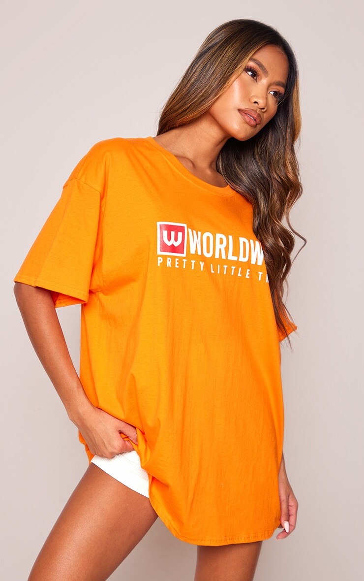 

PrettyLittleThing Оранжевая футболка с принтом World Wide