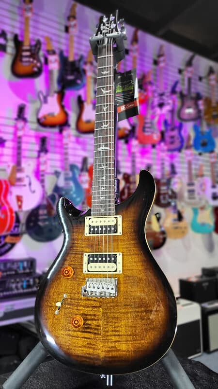 

Электрогитара PRS SE Custom 24 Left-Handed in a Black Gold Burst