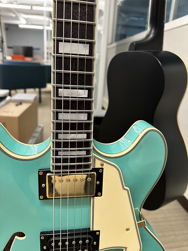 

Электрогитара D'Angelico DELUXE MELANIE FAYE DC LE 2023 - Metallic Surf Green W/Case