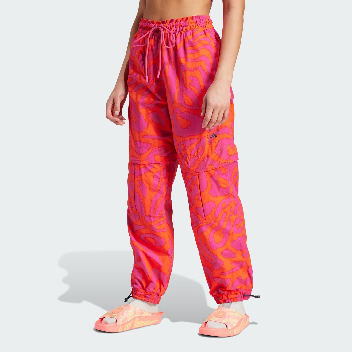 

Спортивные брюки из тканого материала с принтом by Stella McCartney Adidas, цвет Active Orange/Real Magenta