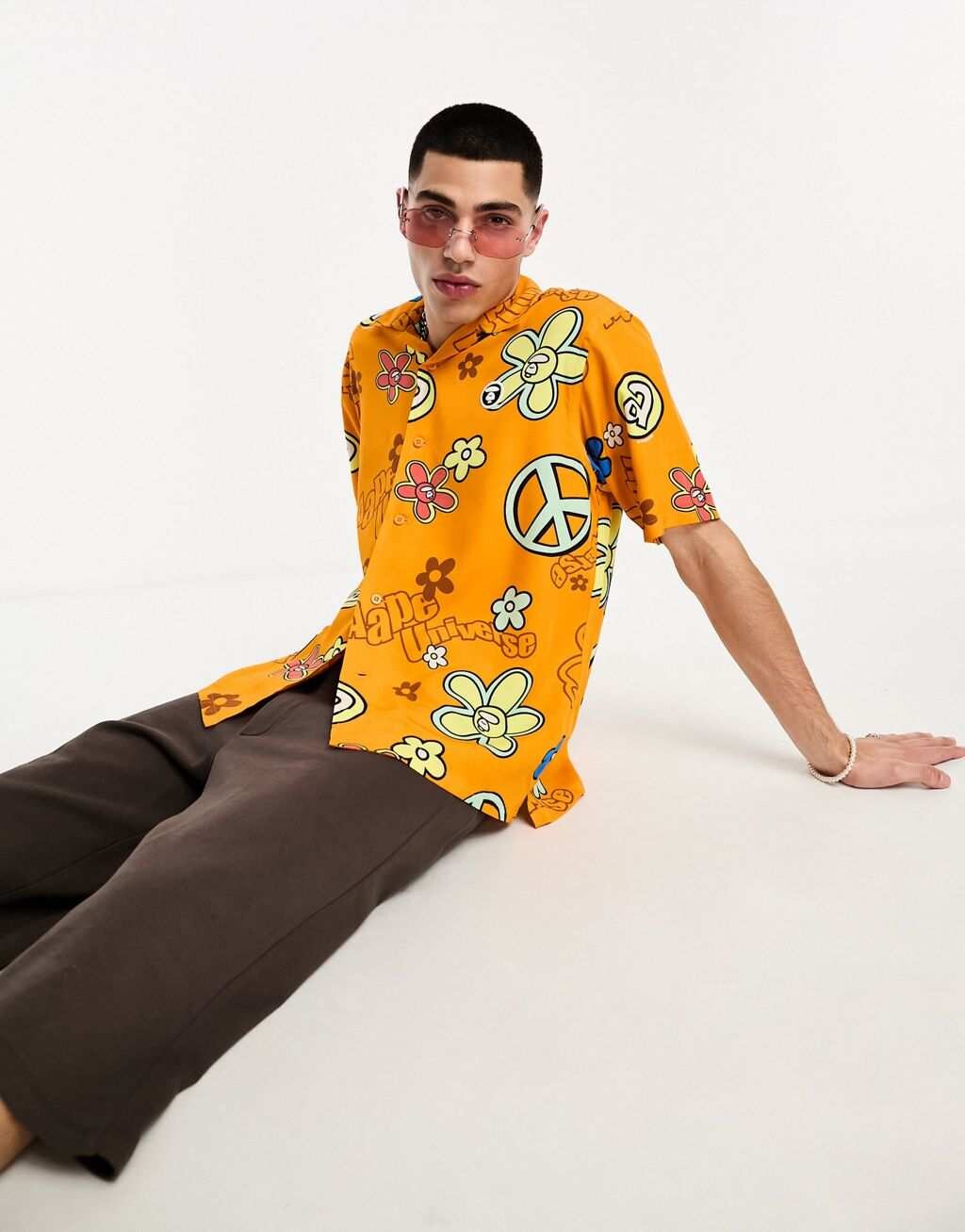 

Оранжевая рубашка с короткими рукавами Aape By A Bathing Ape Peace