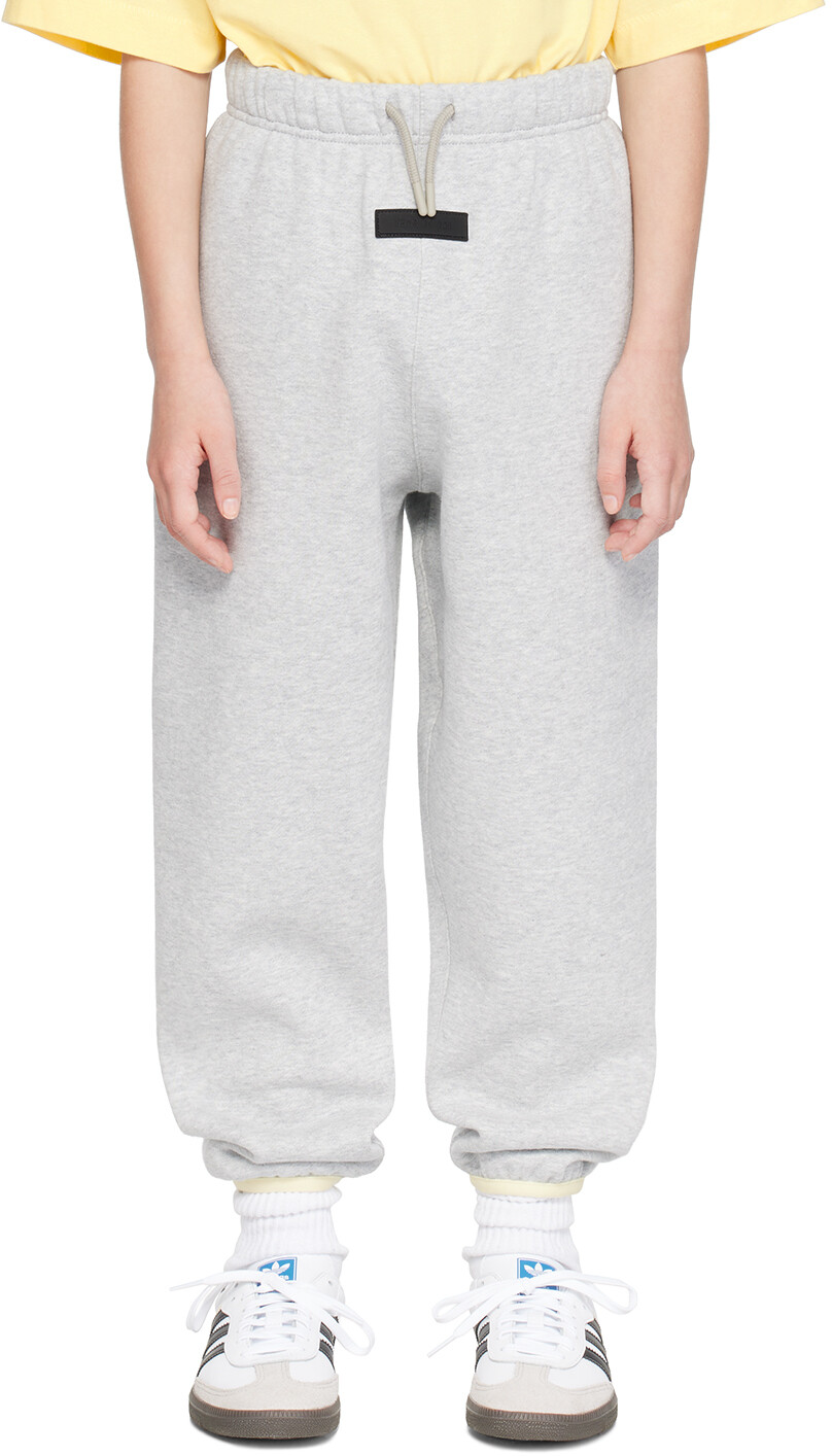 

Детские серые спортивные штаны с нашивками Fear Of God Essentials