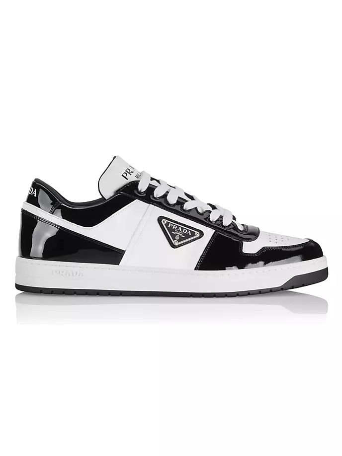 

Низкие кеды Downtown из лакированной кожи Prada, цвет nero bianco