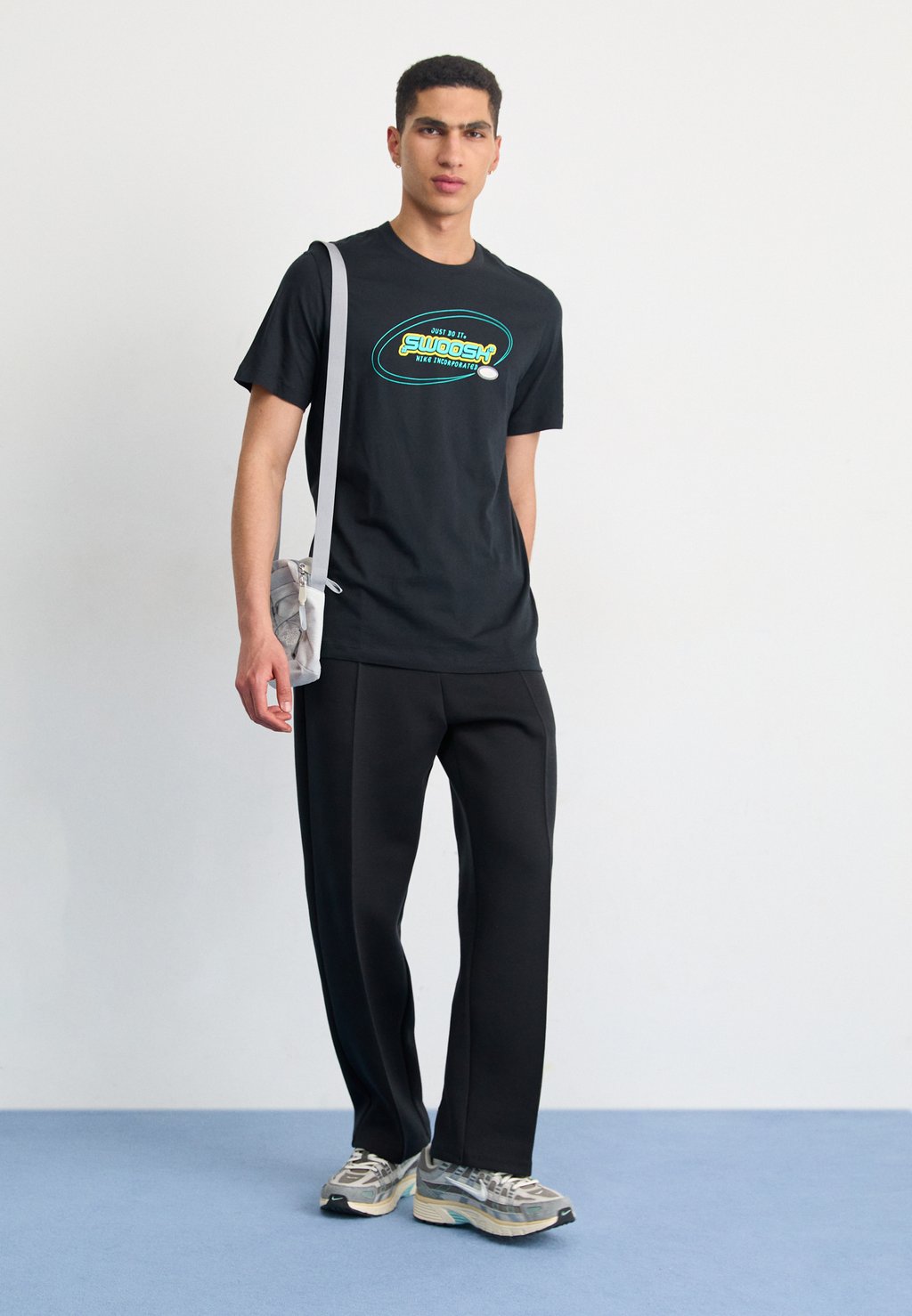 

Брюки тренировочного костюма Tech Fleece Tailored Pant Nike, черные