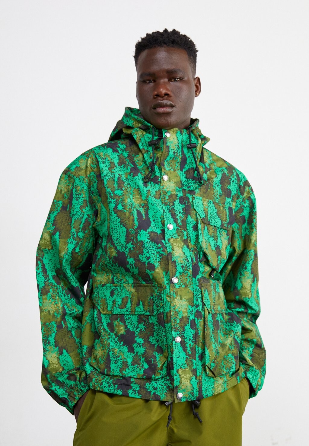 

Дождевик The North Face, зеленый