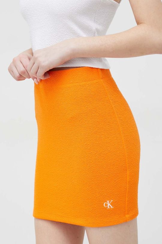 цена Юбка Calvin Klein Jeans, оранжевый