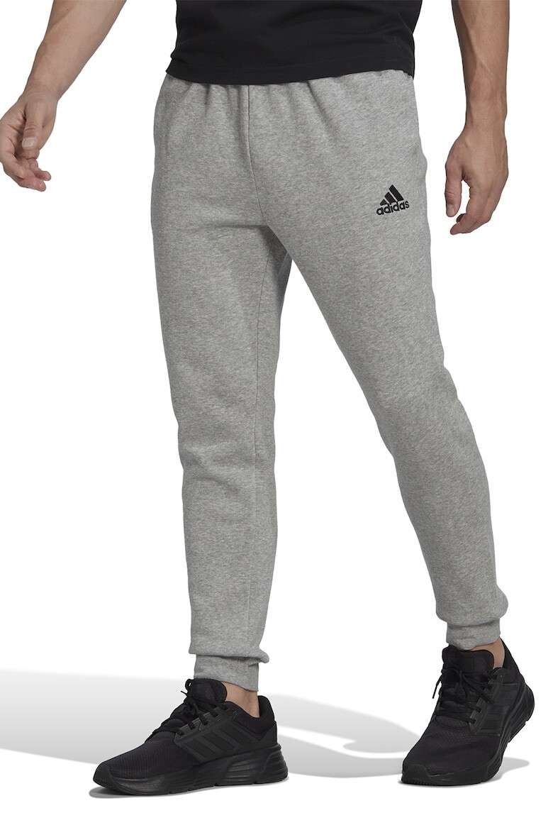 

Уютные спортивные брюки с зауженной брючиной Adidas Sportswear, серый