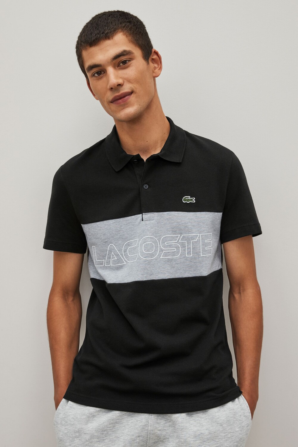 

Черная мужская рубашка-поло в стиле колор-блок Lacoste, черный