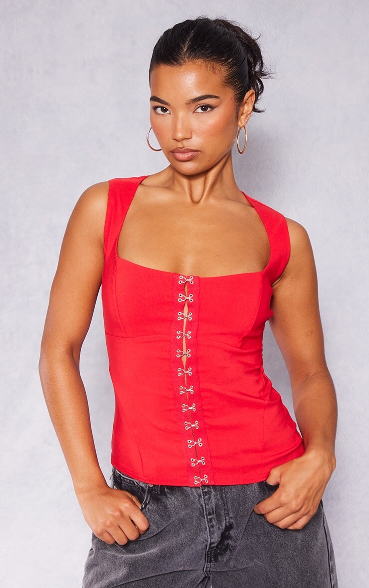 

PrettyLittleThing Красный длинный топ из эластичной ткани с деталями в виде глаз и крючками