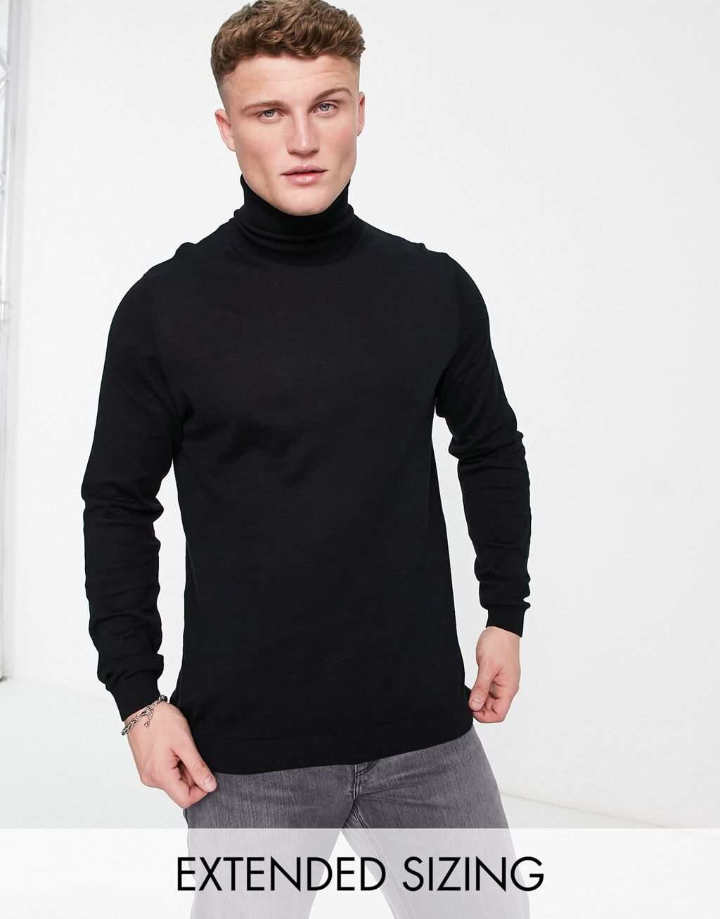 

Черный вязаный хлопковый джемпер с высоким воротником ASOS DESIGN