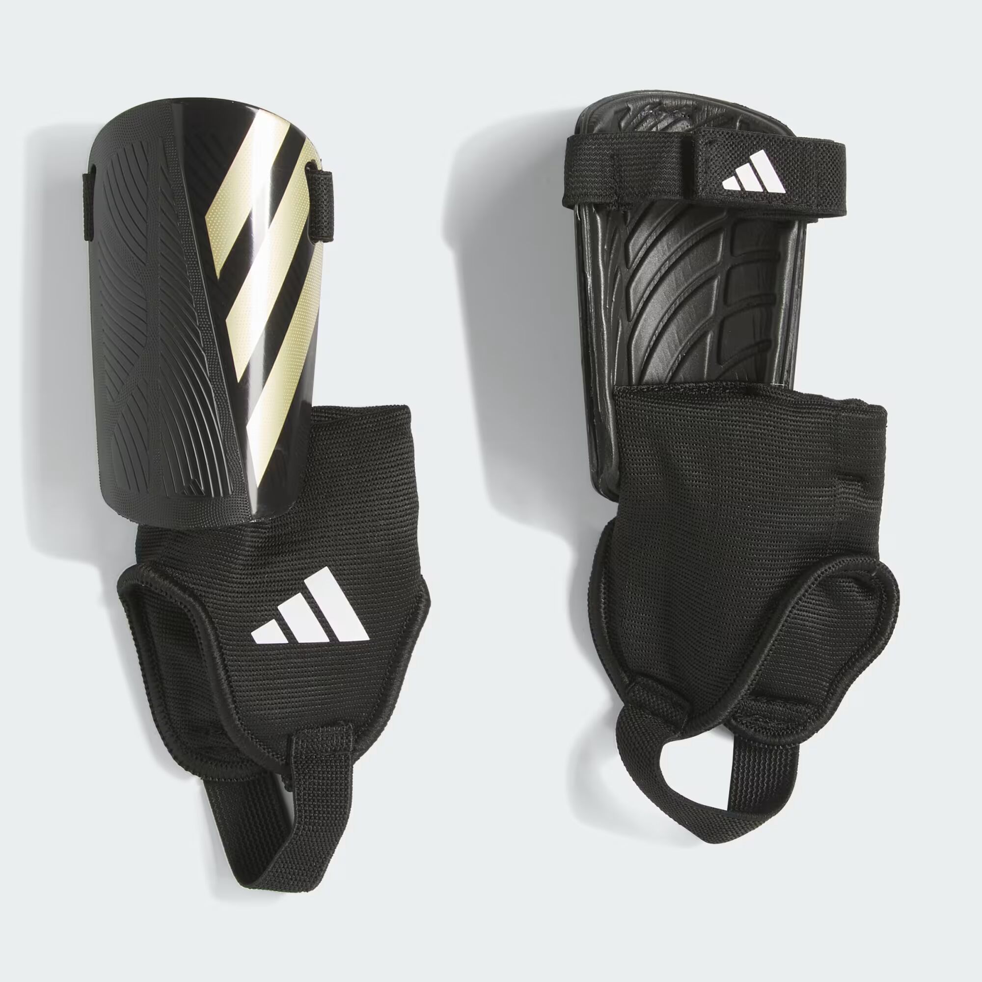 

Защитные щитки Tiro Match детские Adidas, цвет Black/Gold Metallic/White