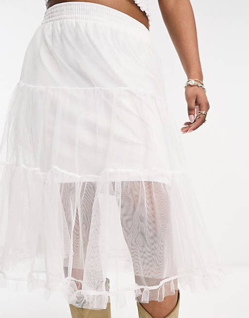 

Многослойная юбка миди цвета слоновой кости из тюля ASOS DESIGN Festival