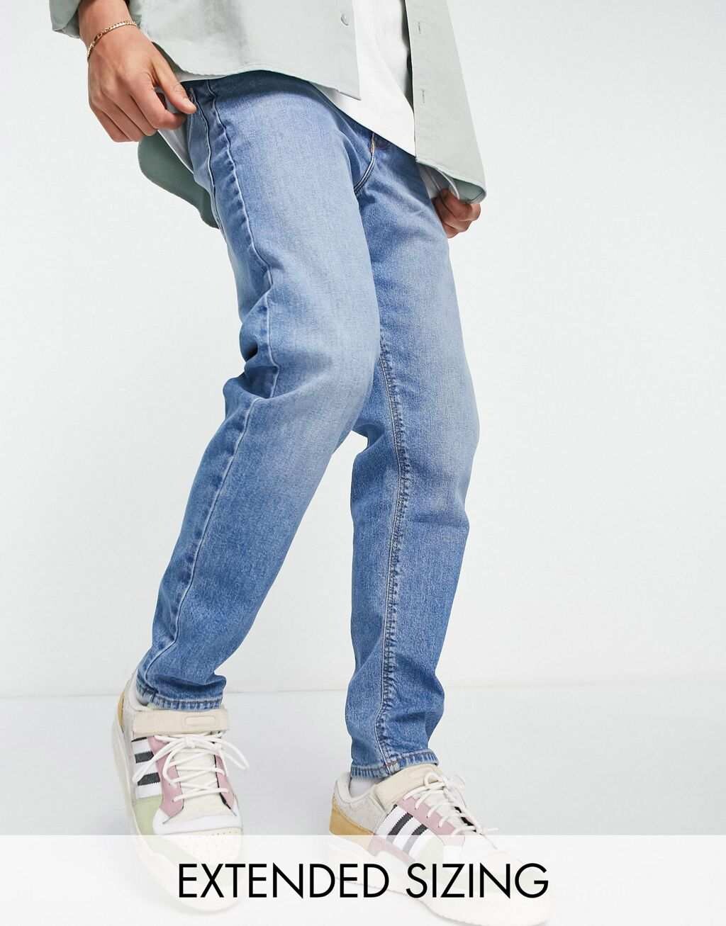 

Джинсы зауженного кроя стрейч ASOS DESIGN средней потертости в стиле 90-х