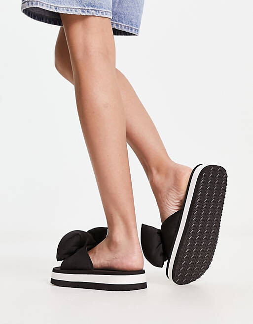 

Черные сандалии на платформе Charles & Keith с пышным бантом