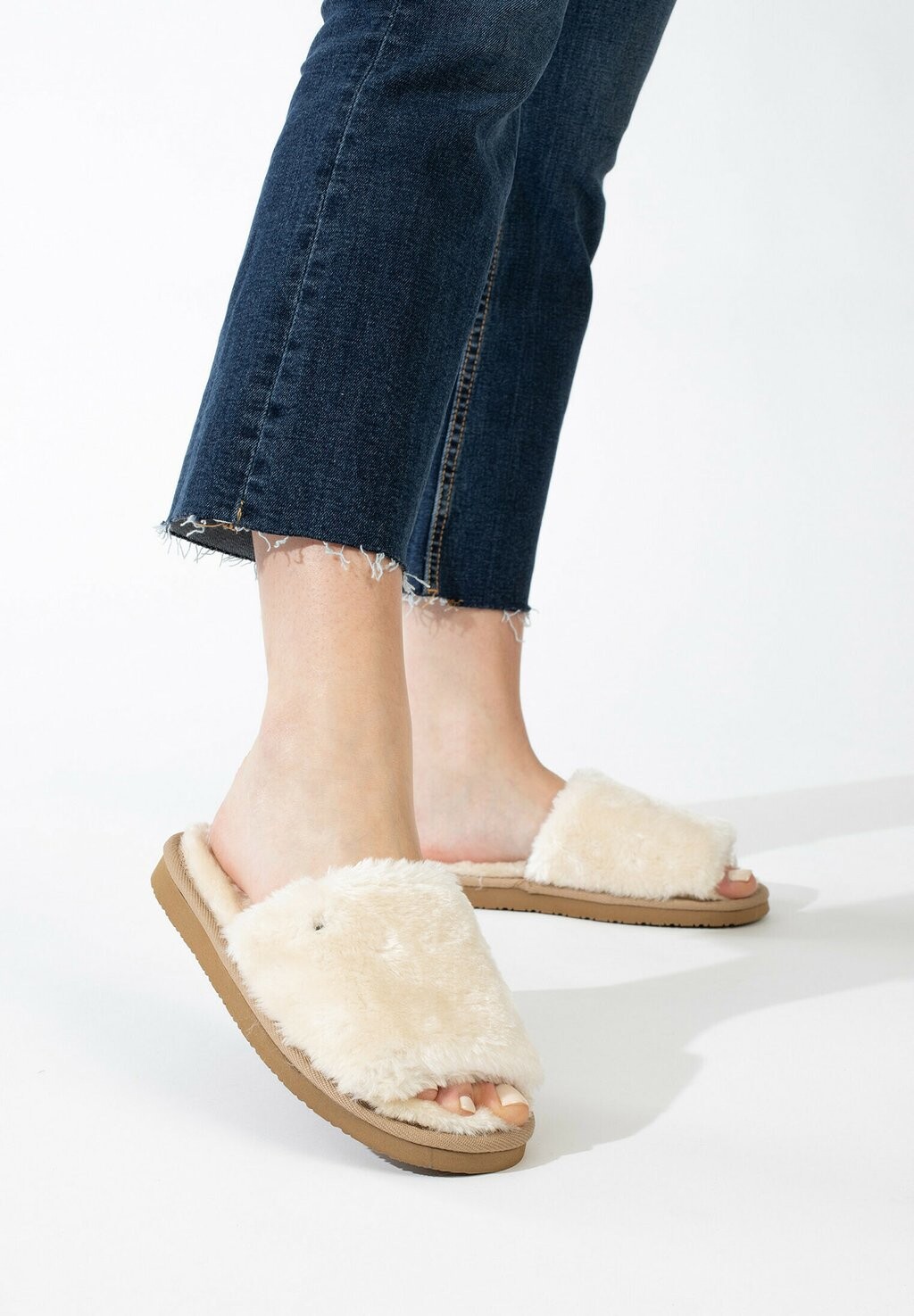 

Шлепанцы Minnetonka