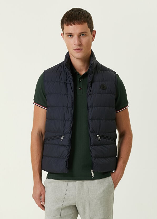 

Темно-синий пышный жилет Moncler