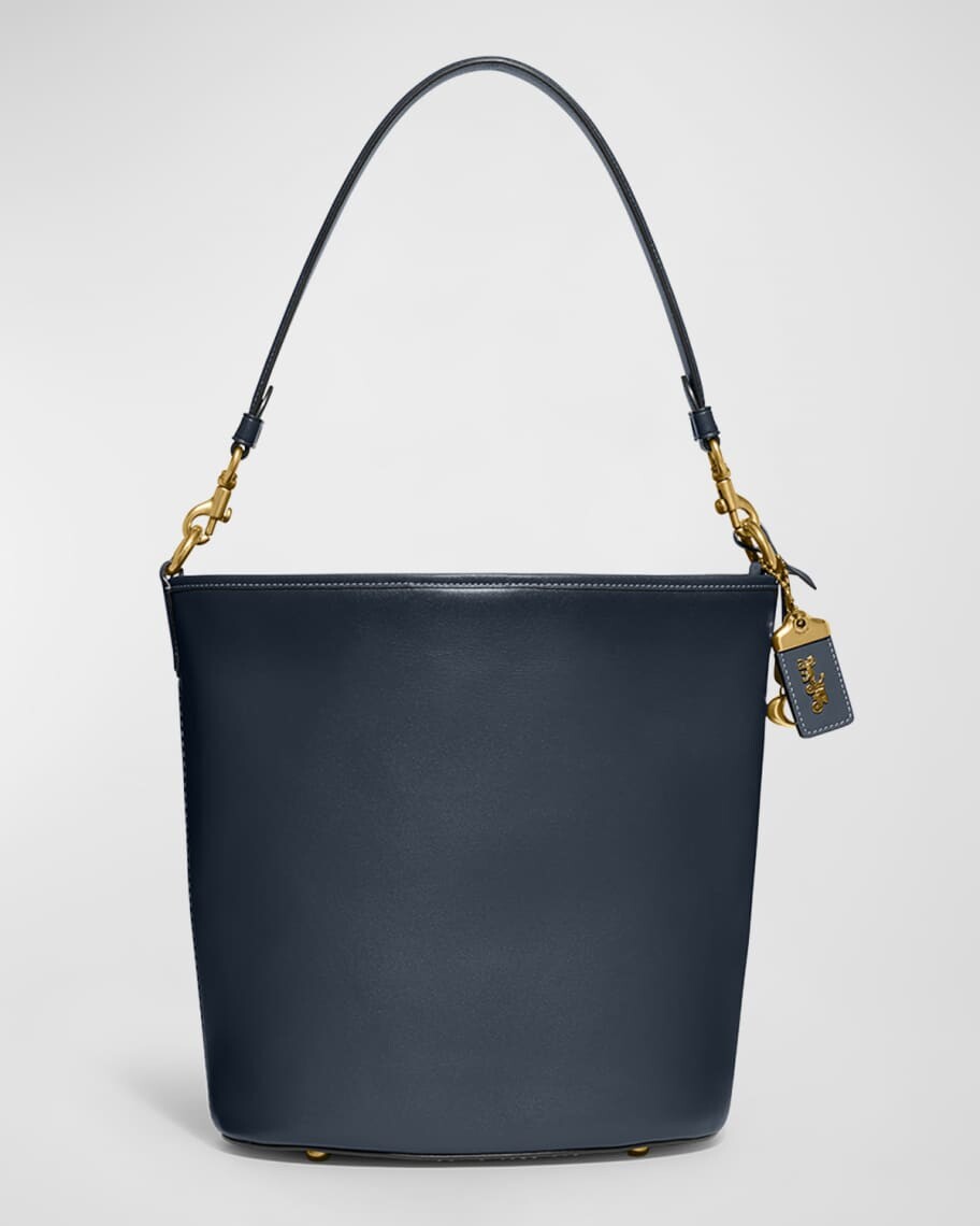

Сумка-мешок Dakota из дубленой кожи Coach