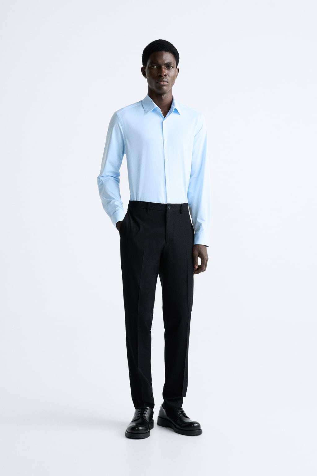 

Полосатая эластичная рубашка ZARA