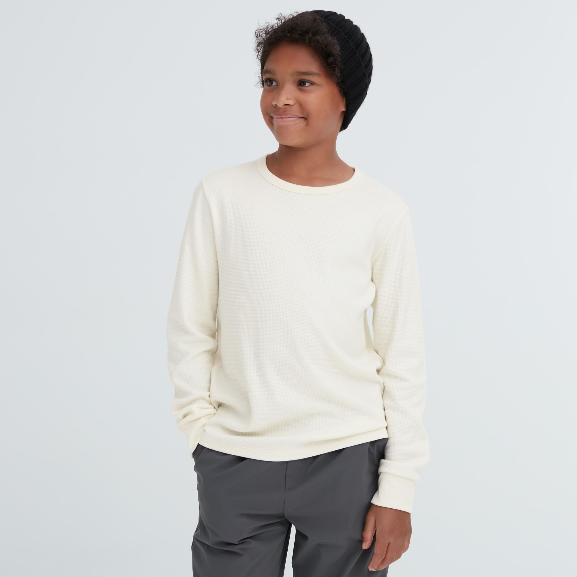 

Хлопковый лонгслив Heattech Uniqlo Kids, кремовый