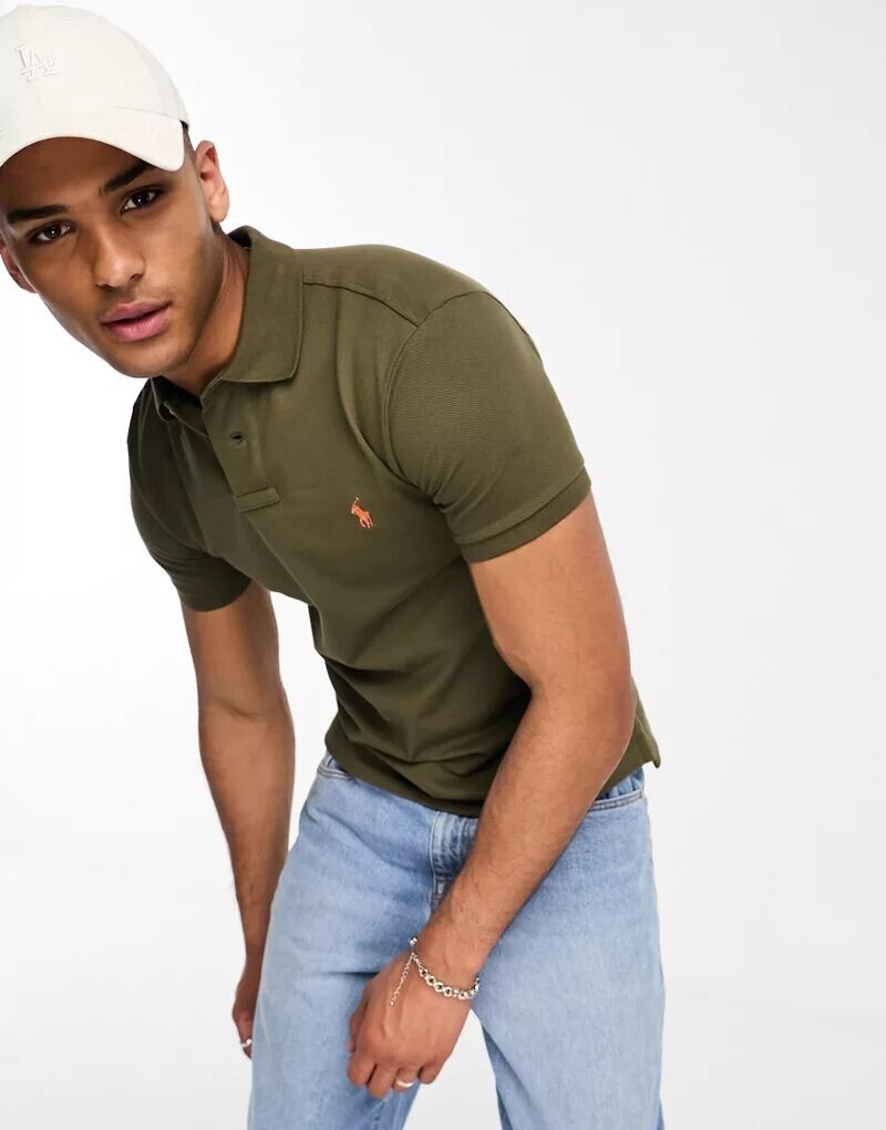 

Зеленое поло узкого кроя из пике с логотипом Polo Ralph Lauren