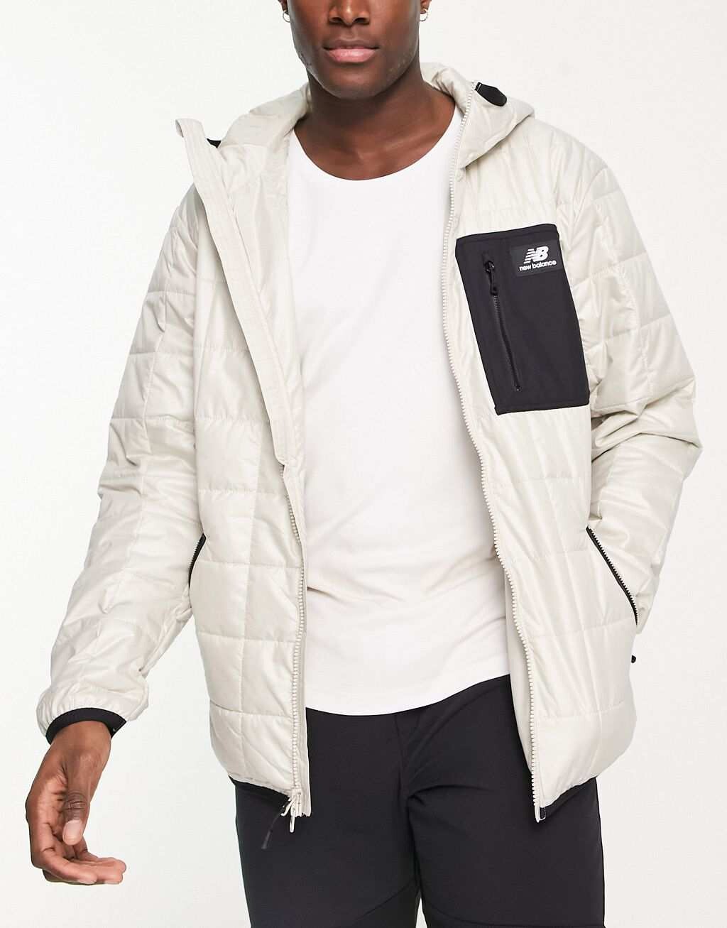 

Черная стеганая куртка унисекс All Terrain New Balance, Черный