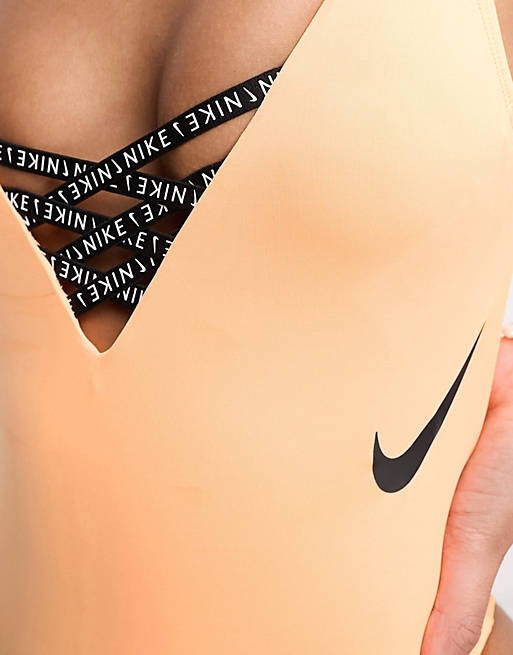 

Оранжевый слитный купальник Nike Swim Icon Sneakerkini
