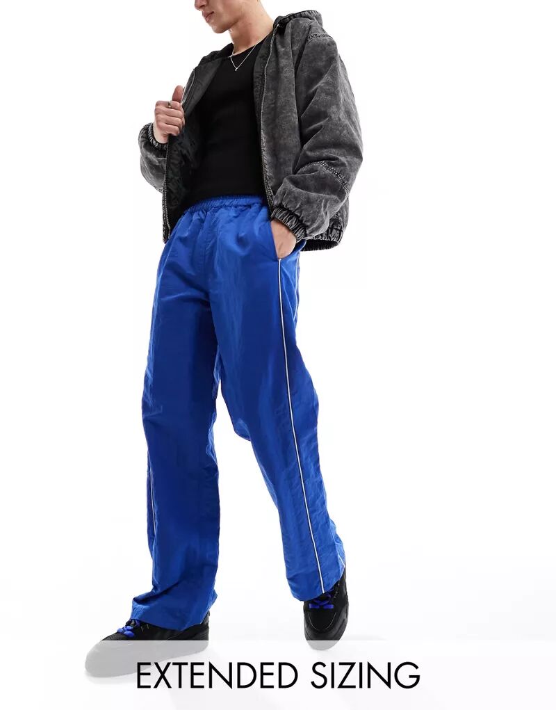 Синие широкие спортивные брюки из нейлона с белой окантовкой ASOS
