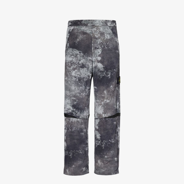 

Брюки с камуфляжным узором dissolve Stone Island, серый