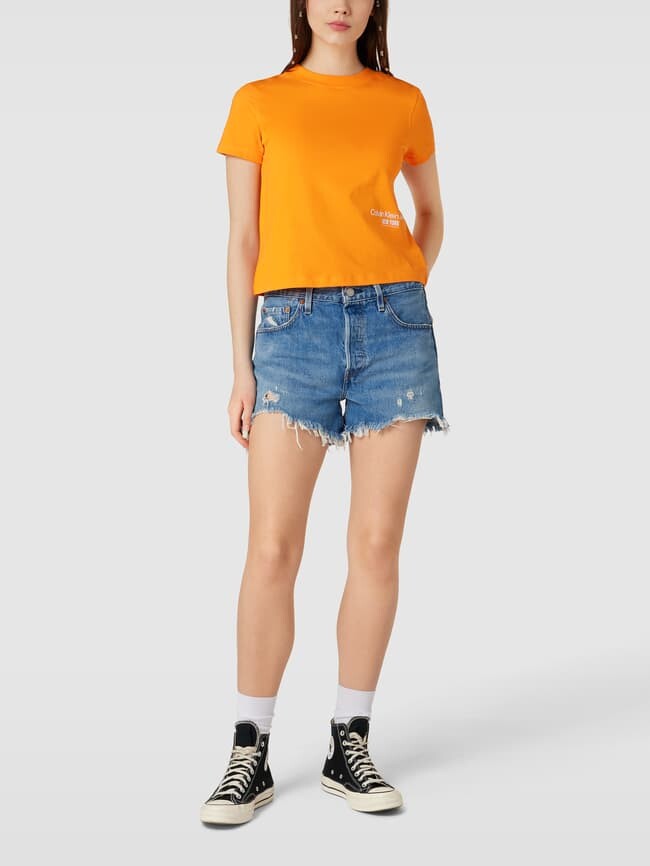 

Футболка с принтом этикетки Calvin Klein Jeans, оранжевый