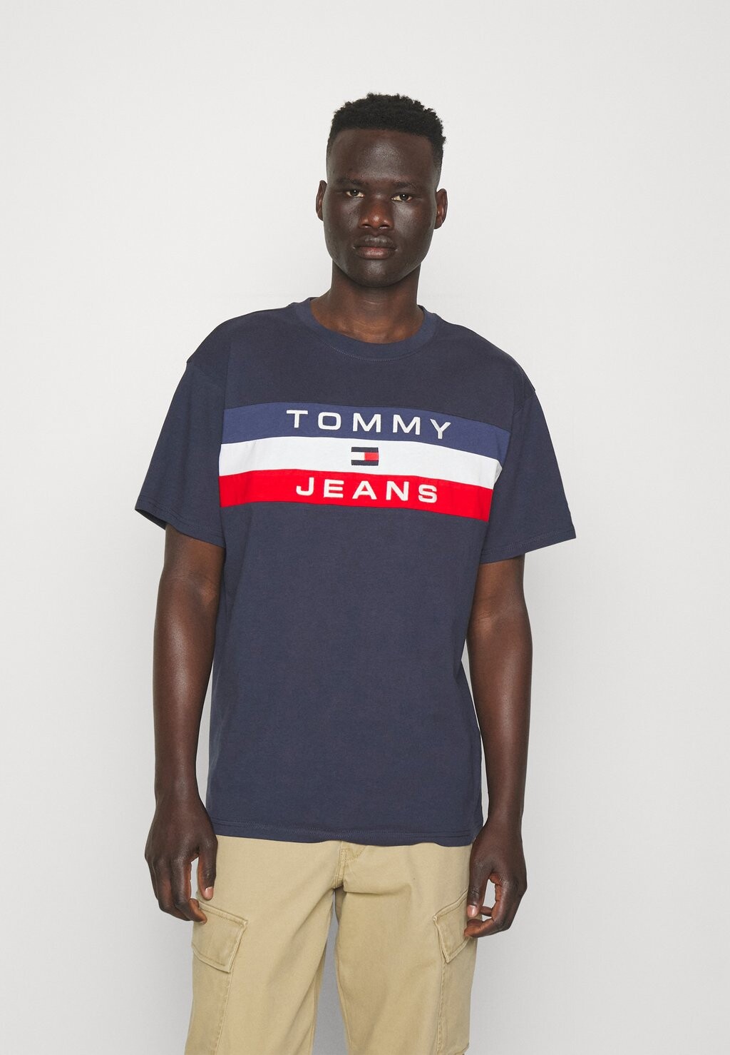 

Футболка с принтом ФУТБОЛКА COLORBLOCK Tommy Jeans, темно-синий