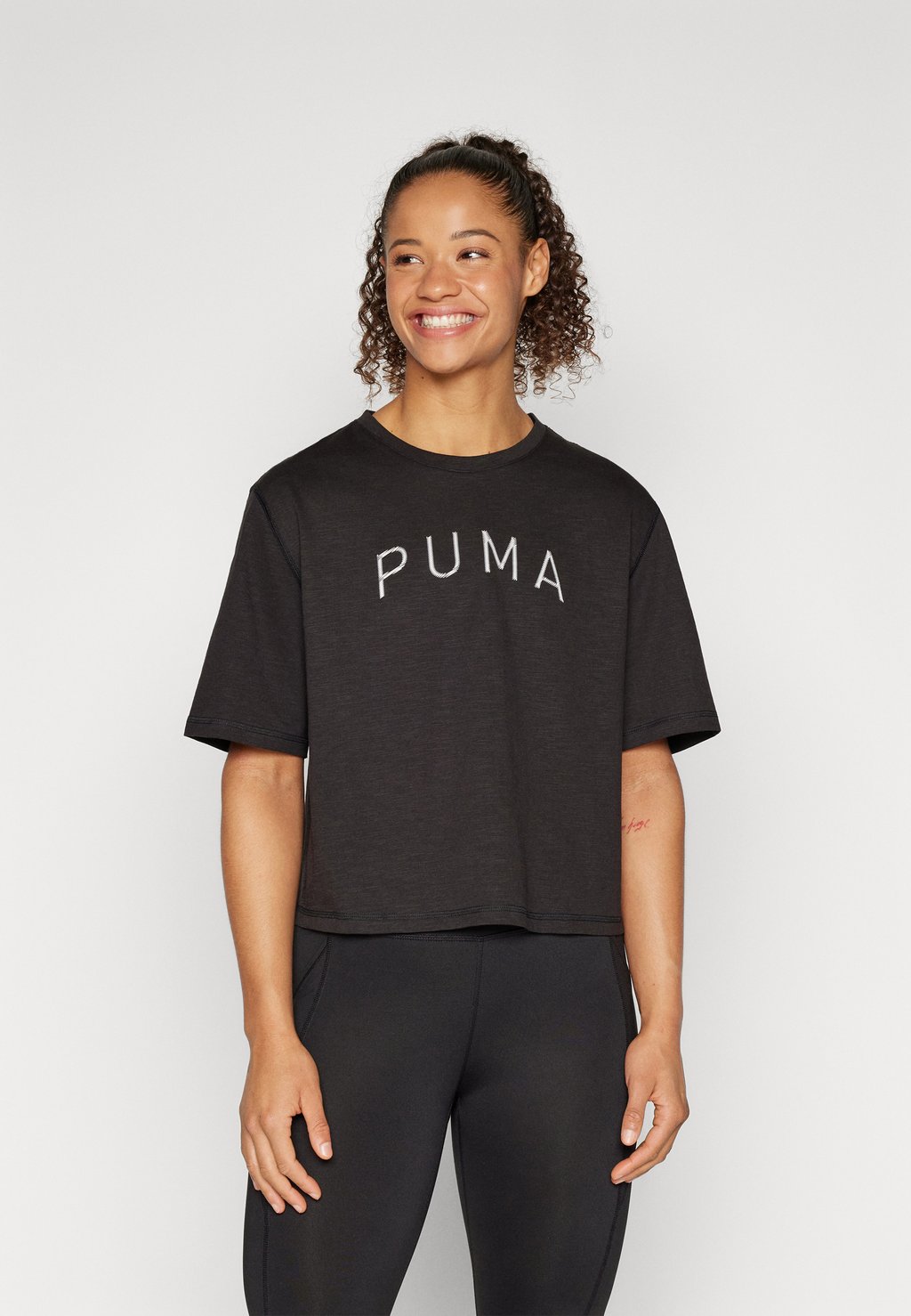 Спортивная футболка WOMEN’S GRAPHIC BOXY CROP MOVE TEE Puma, цвет black