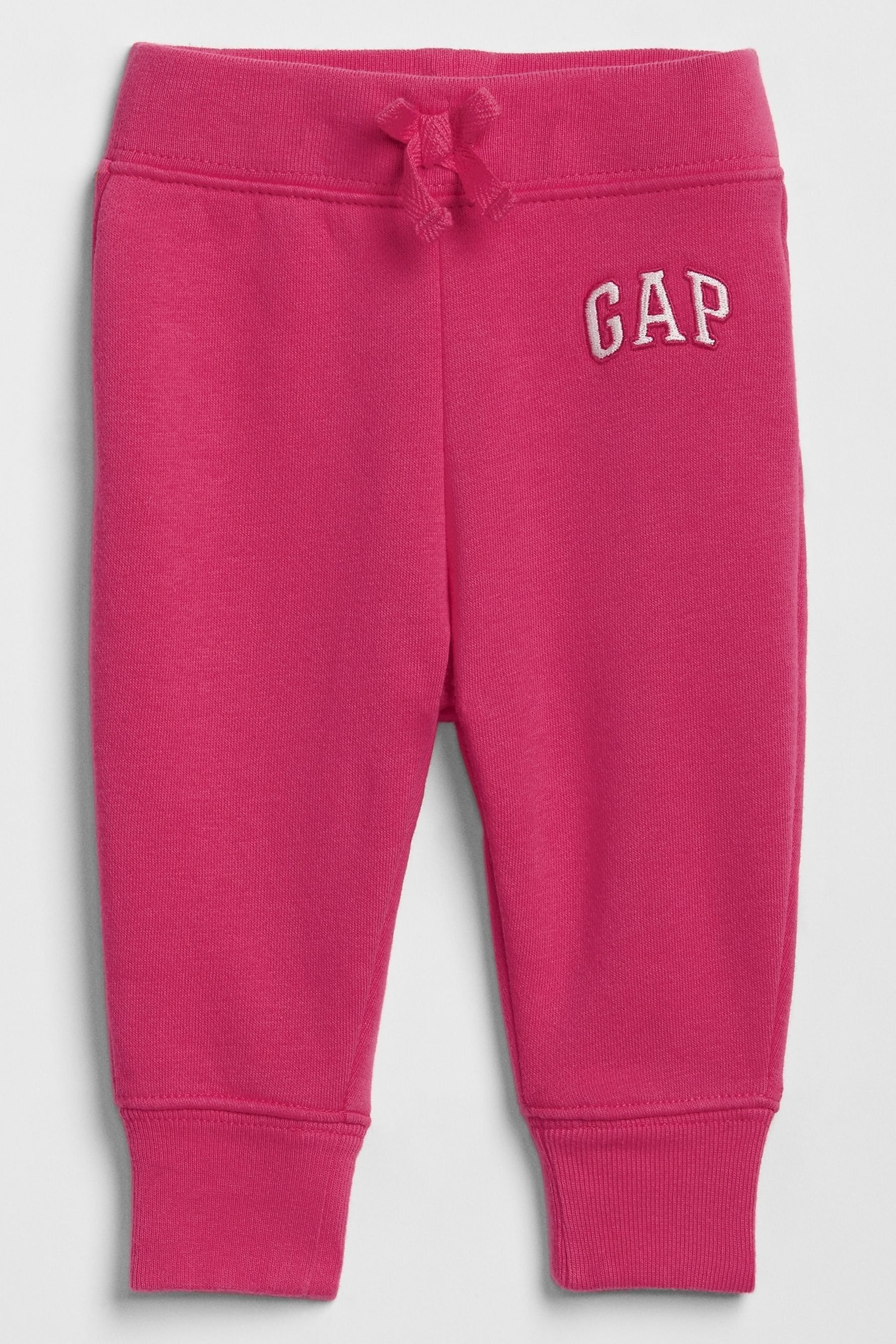 Флисовые джоггеры с неоновым логотипом Gap, розовый