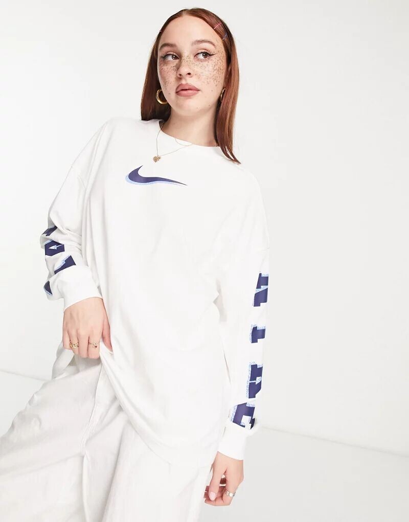 

Белая футболка с длинным рукавом и графическим принтом Nike Sportswear
