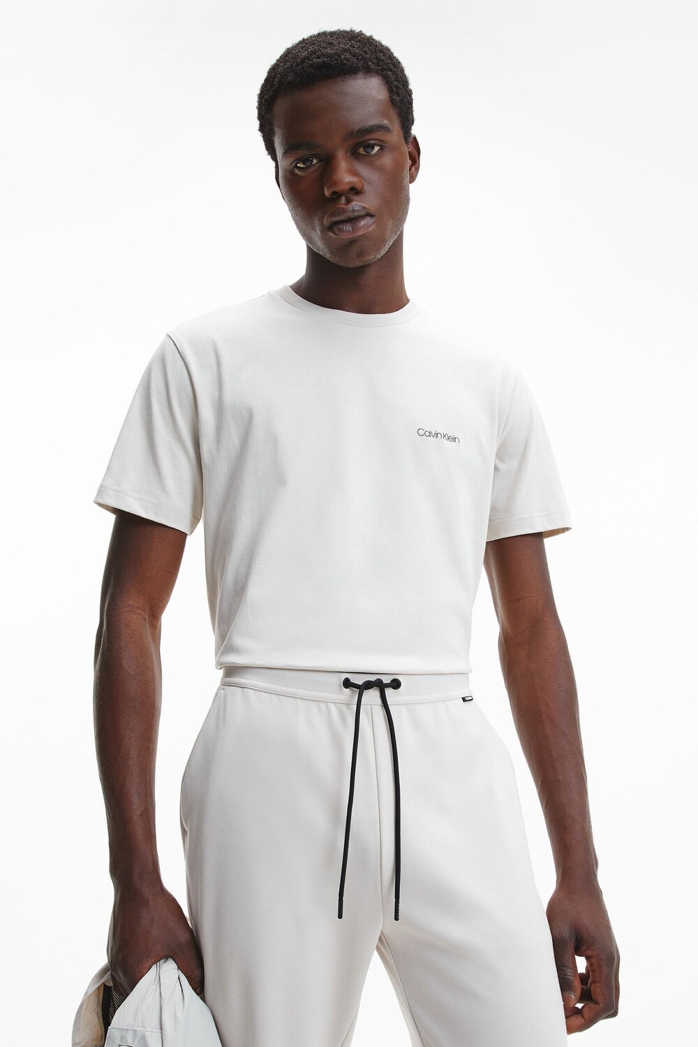 

Хлопковая футболка кремового цвета с логотипом на груди Calvin Klein, бежевый