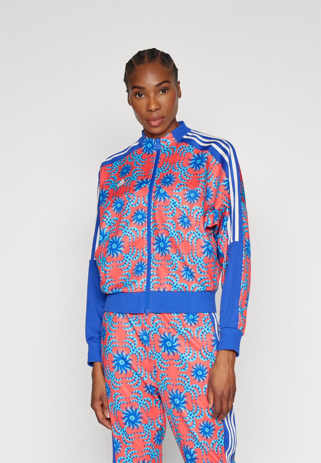 

Толстовка ADIDAS X FARM TIRO TRACK TOP adidas Sportswear, цвет bright red/signal cyan