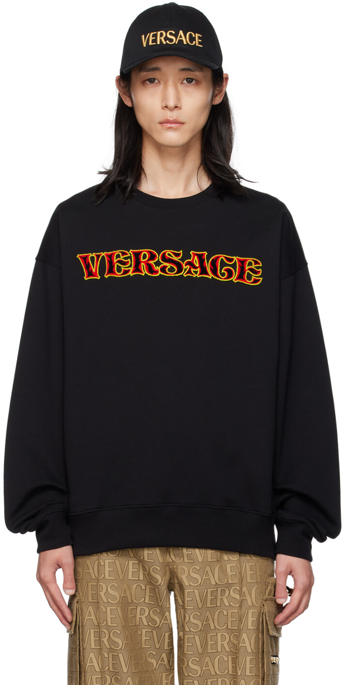 

Черный свитшот с флоковым рисунком Versace