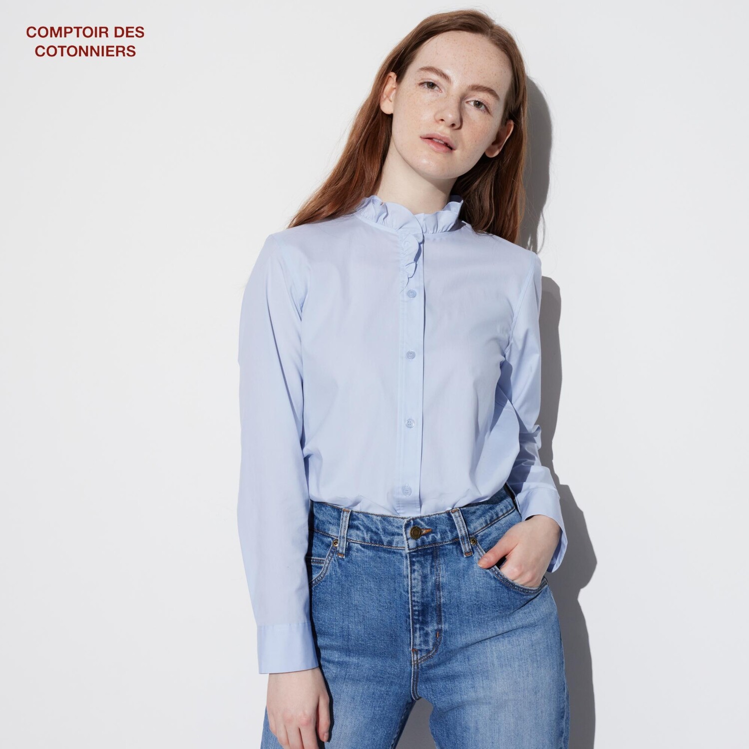 

Рубашка UNIQLO из эластичного хлопка с рюшами, светло-синий