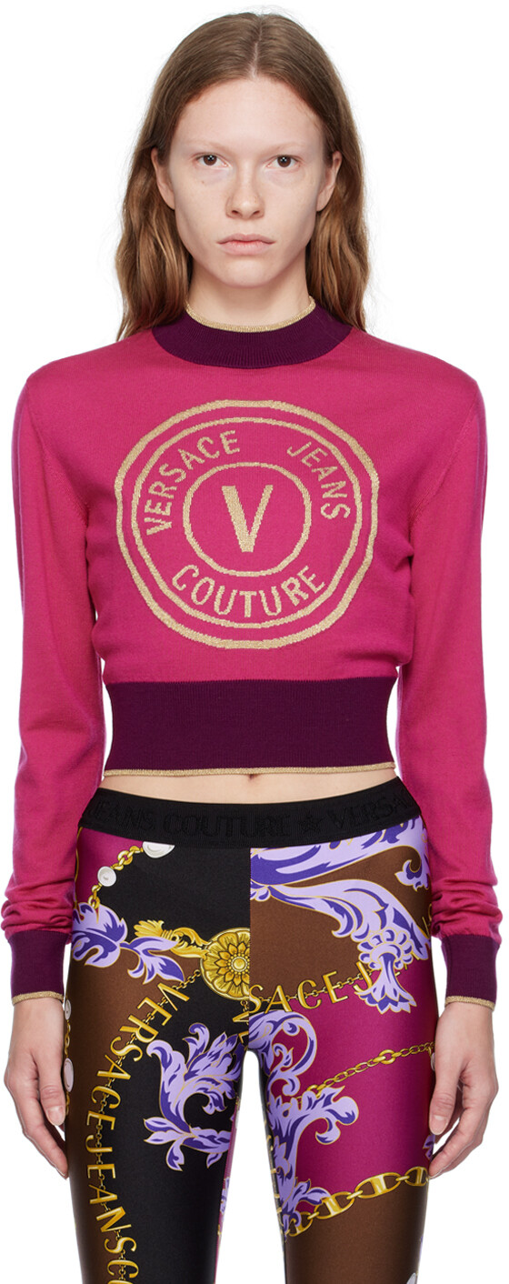 

Розовый свитер с V-образной эмблемой Versace Jeans Couture
