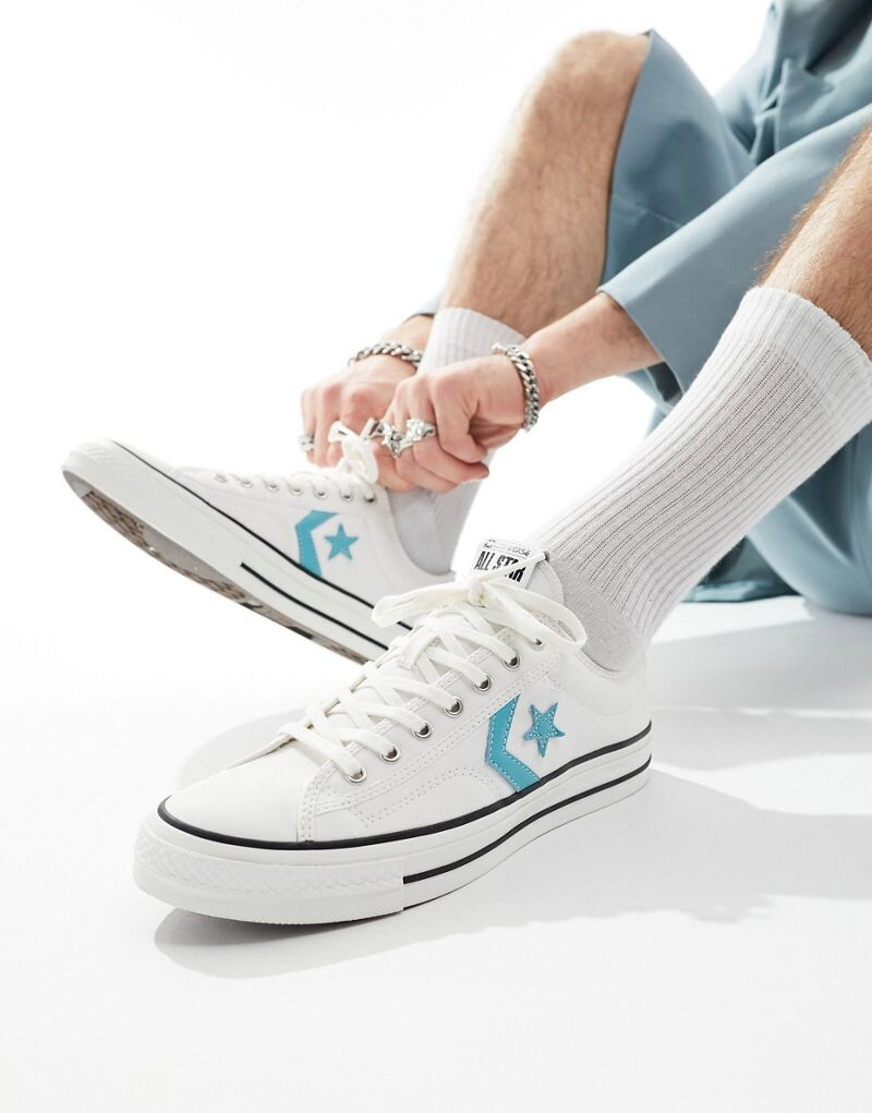 

Белые кроссовки Converse Star Player 76 с синими деталями