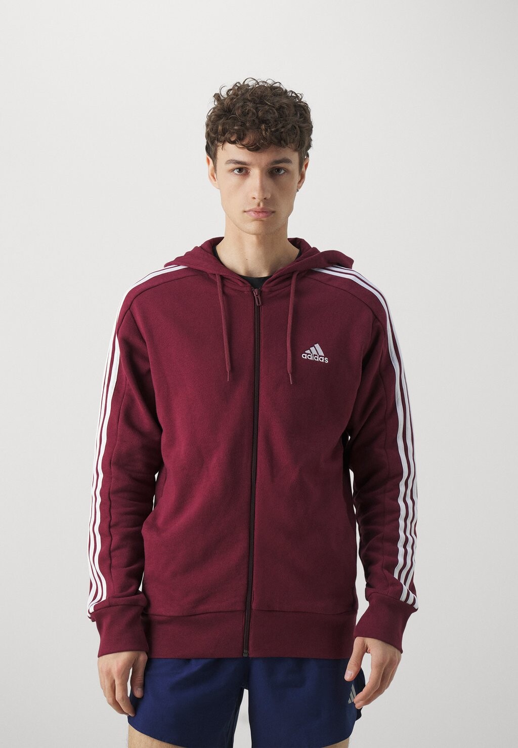 

Толстовка на молнии Essentials French Terry Stripes Full Zip adidas Sportswear, цвет shadow red