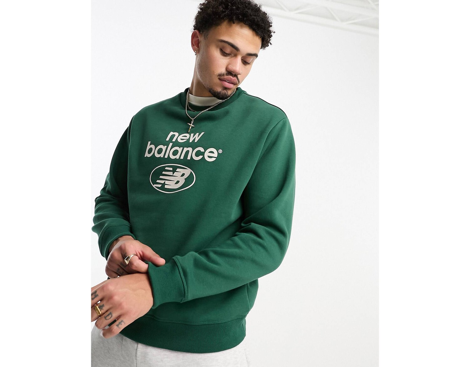 

Зеленый свитшот New Balance Essentials Novelty