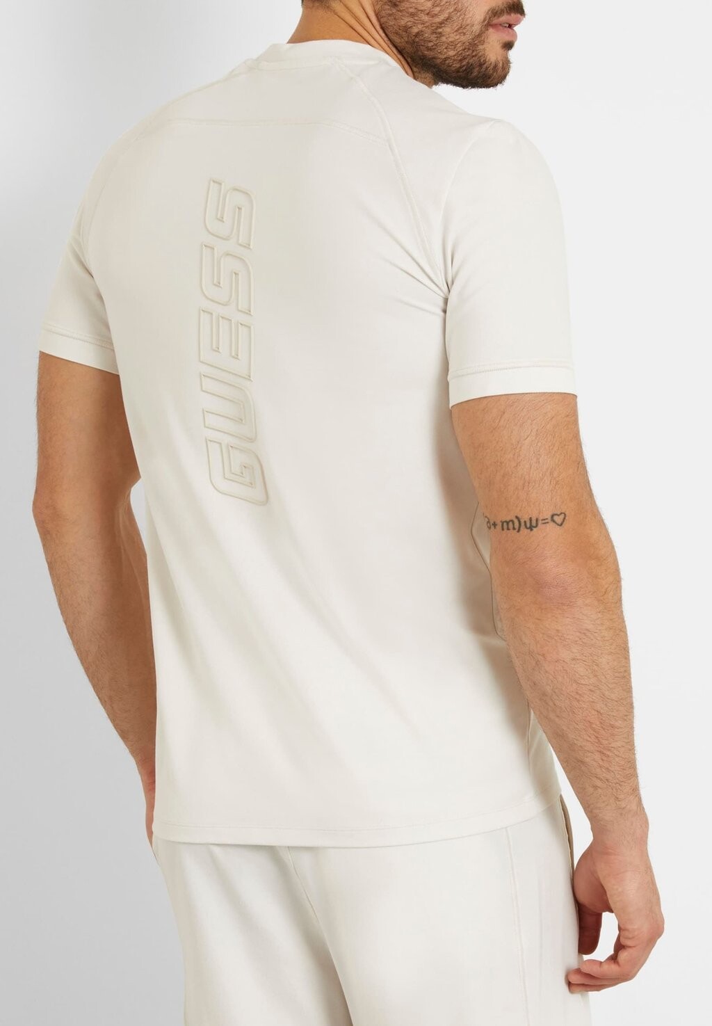 

Футболка с принтом STRETCH KLEINES LOGO-DREIECK Guess, цвет creme