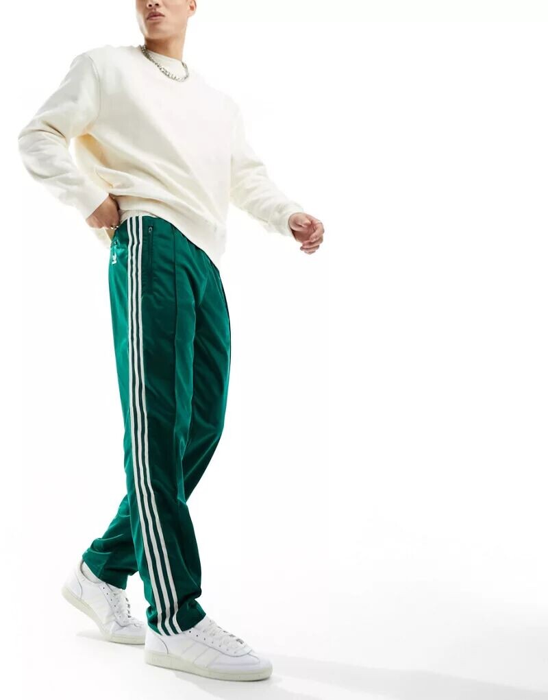

Зеленые и кремовые спортивные брюки adidas Originals archive