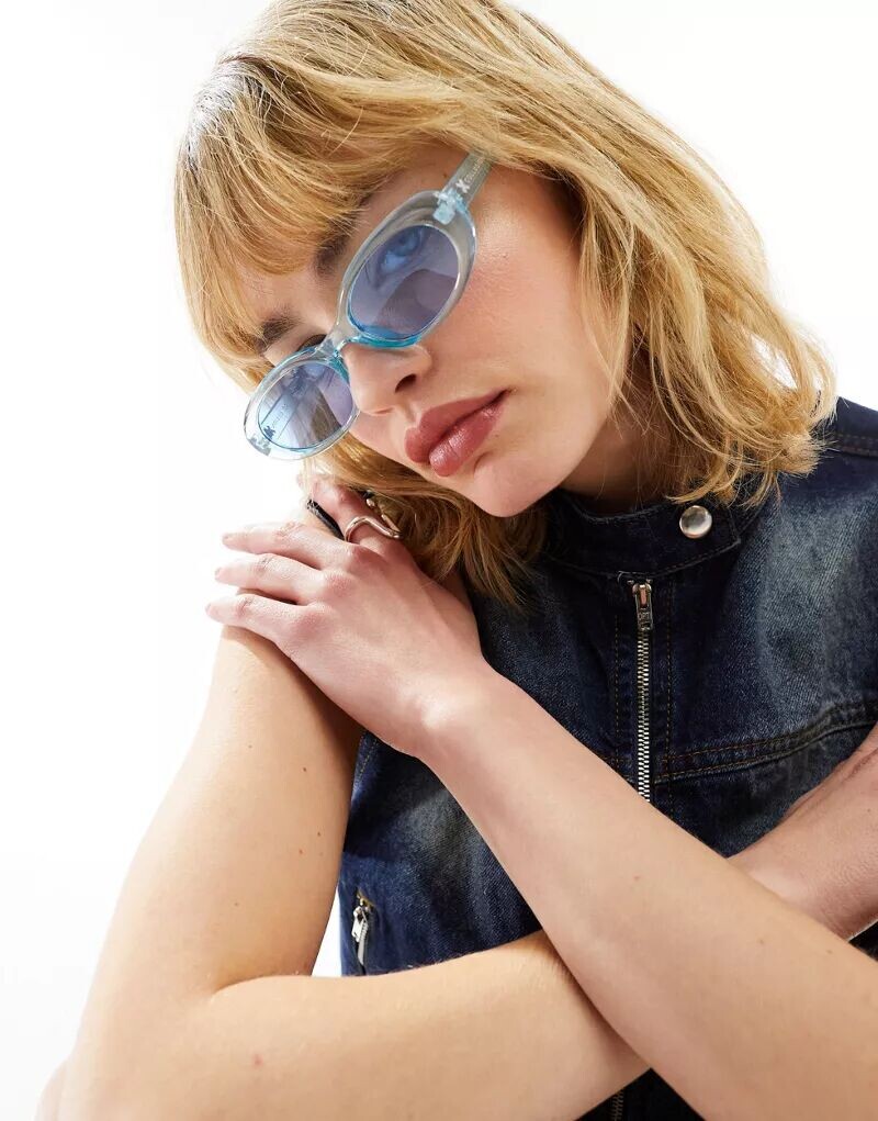 

Голубые овальные солнцезащитные очки ASOS DESIGN Collusion