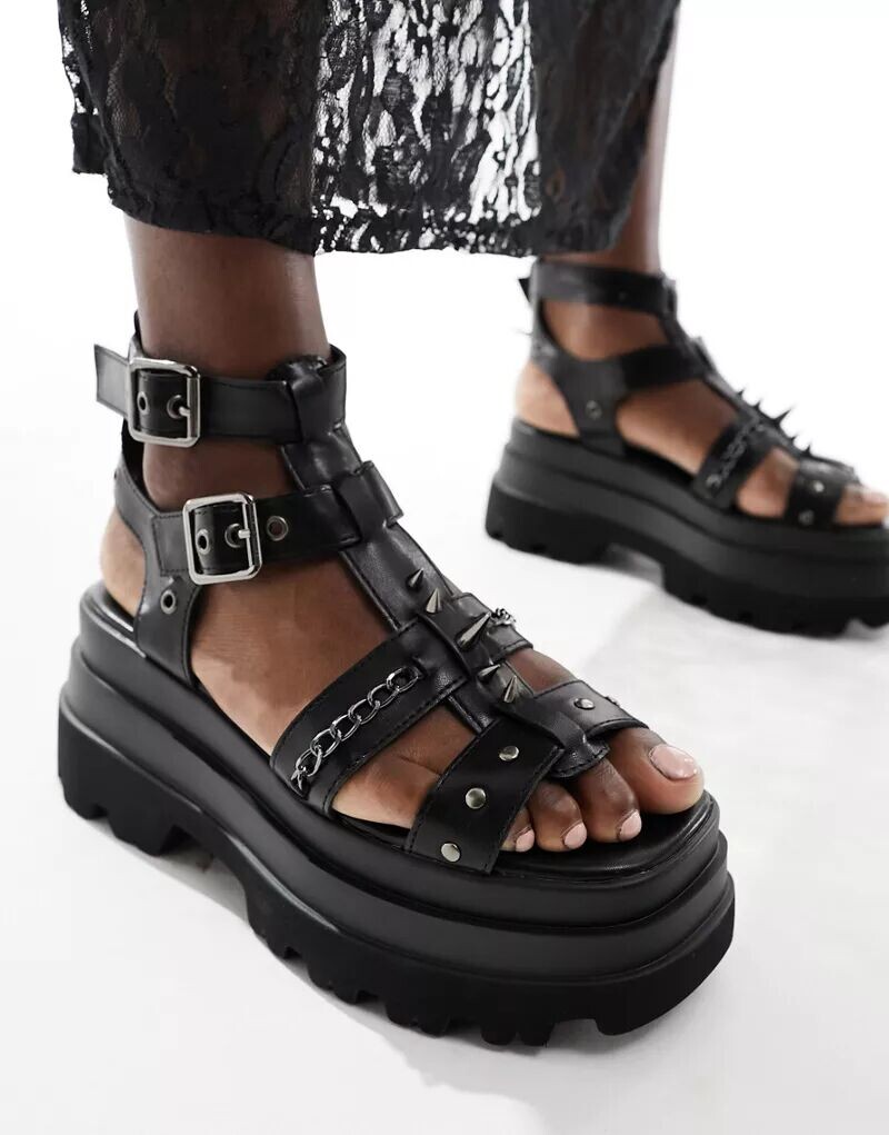 

Черные сандалии Koi He Divine с шипами и массивной подошвой Koi Footwear