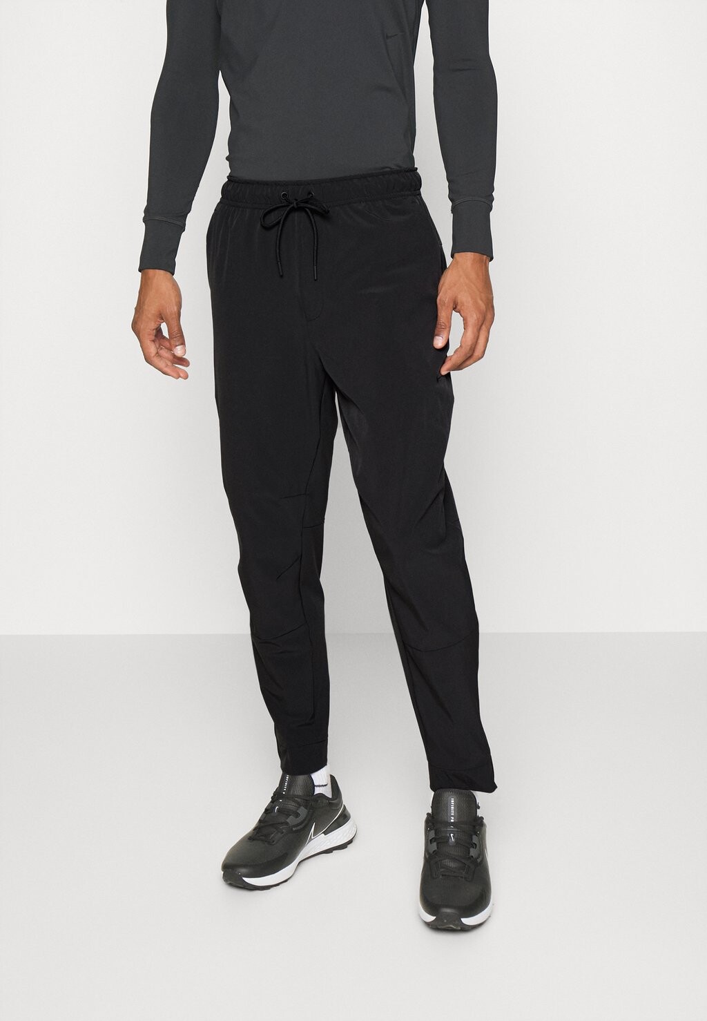 

Спортивные брюки Nike Unlimited Pant, черный / черный