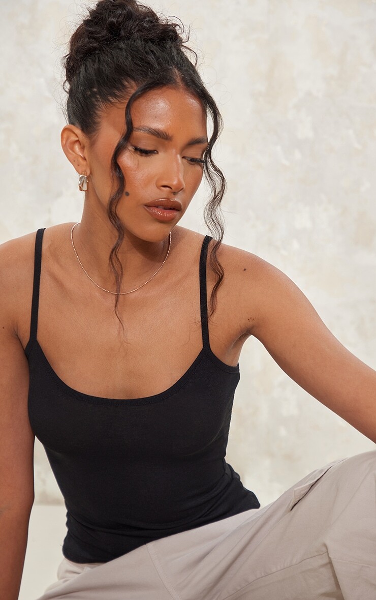 

PrettyLittleThing Черный удлиненный жилет из сетки Burnout Mesh