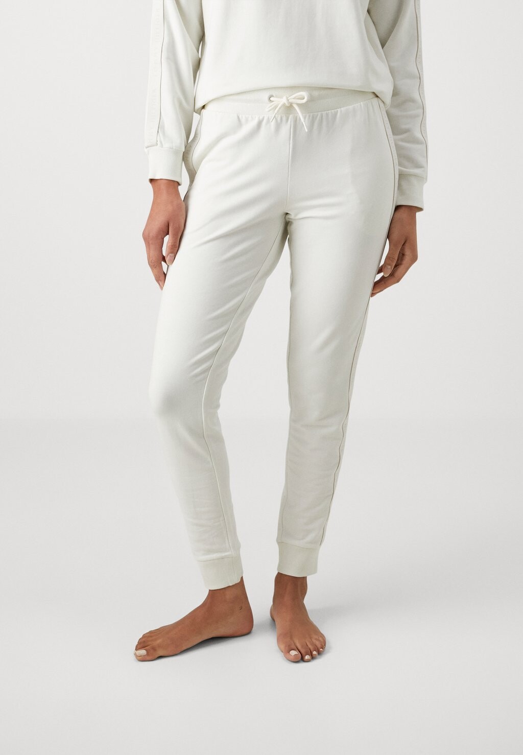 

Пижамные брюки ESTABLISHED CUFFED TRACK PANT Tommy Hilfiger, крем