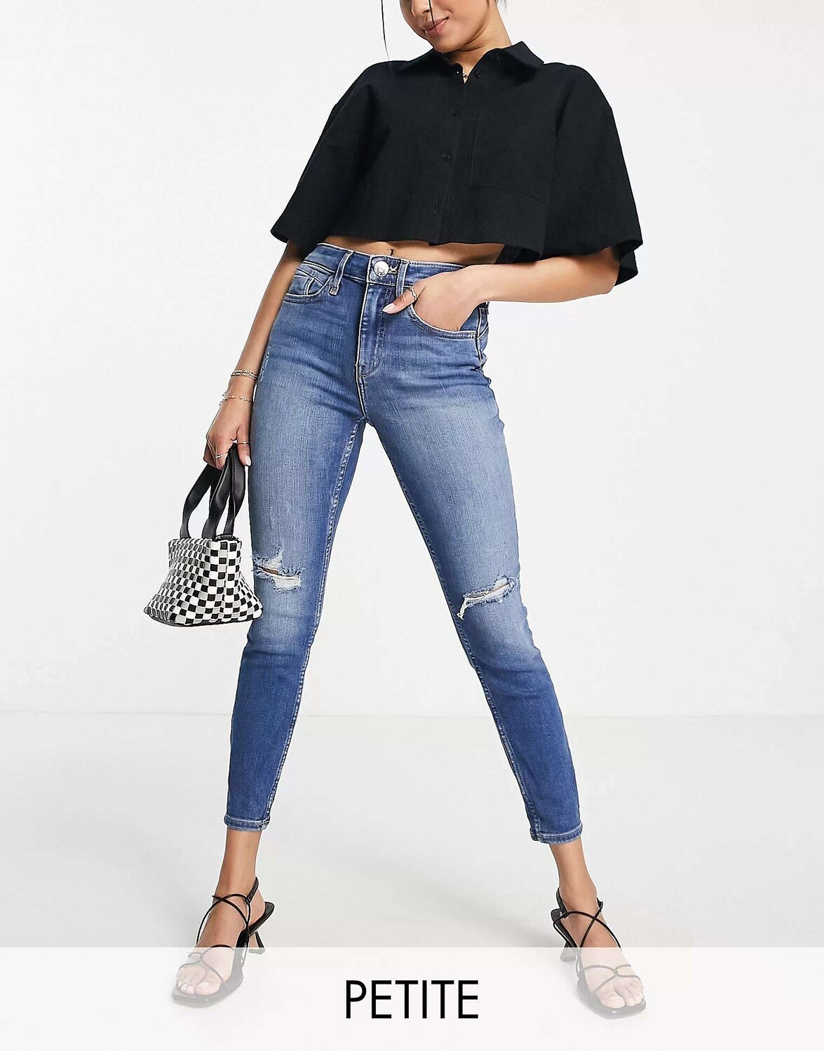

Синие рваные джинсы скинни River Island